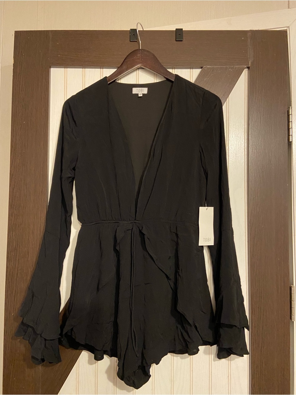 Tobi Black Long-Sleeve Wrap Tunic with Ruffle Cuffs
